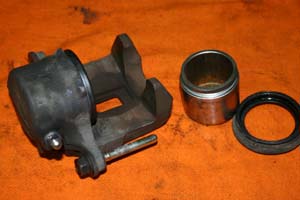 Rear brake caliper piston