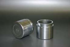 Rear brake caliper piston